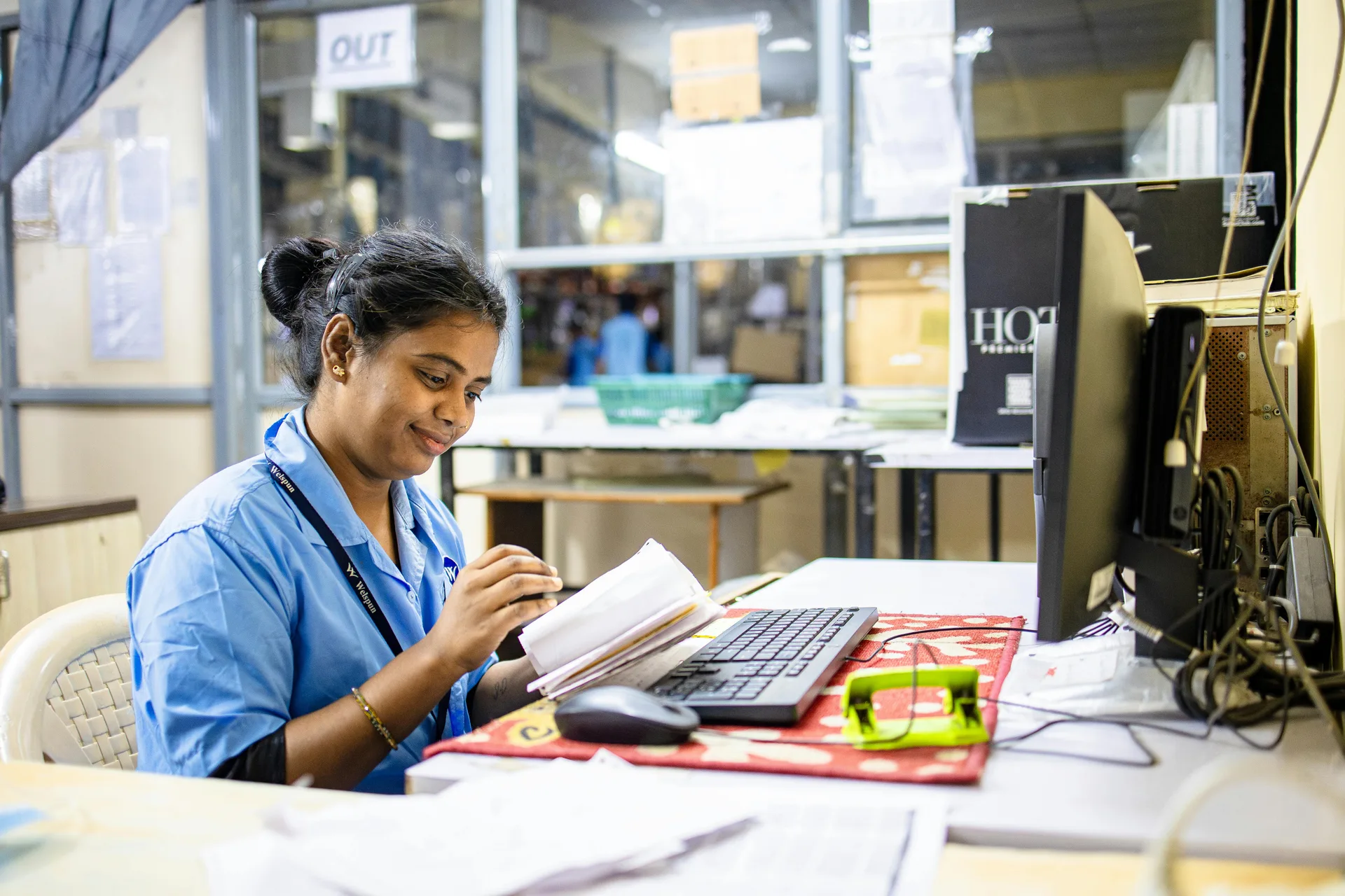 Career training participant studying at a computer workstation