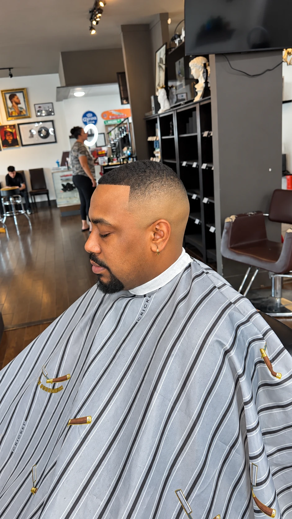 Precision fade created by Top Shelf Barber Lounge